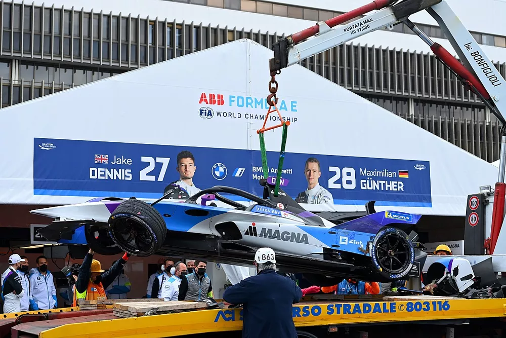 Mechanics unload the damaged car of Jake Dennis, BMW I Andretti Motorsport, BMW iFE.21