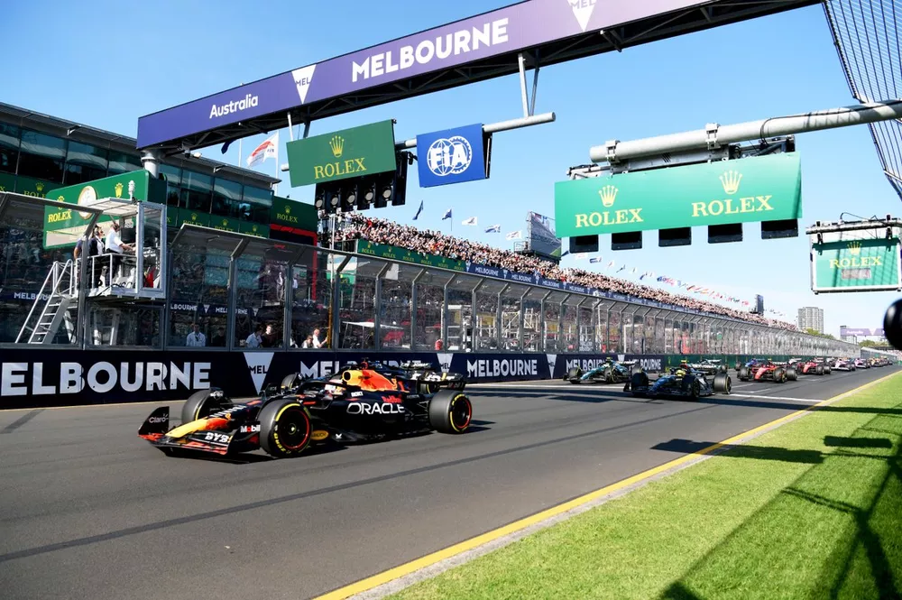 Max Verstappen, Red Bull Racing RB19, leads George Russell, Mercedes F1 W14, Lewis Hamilton, Mercedes F1 W14, at the start
