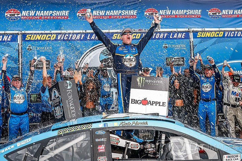 Harvick bumps Kyle Busch out of way to win New Hampshire