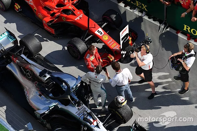 Lewis Hamilton, Mercedes-AMG F1 and Sebastian Vettel, Ferrari celebrate in parc ferme