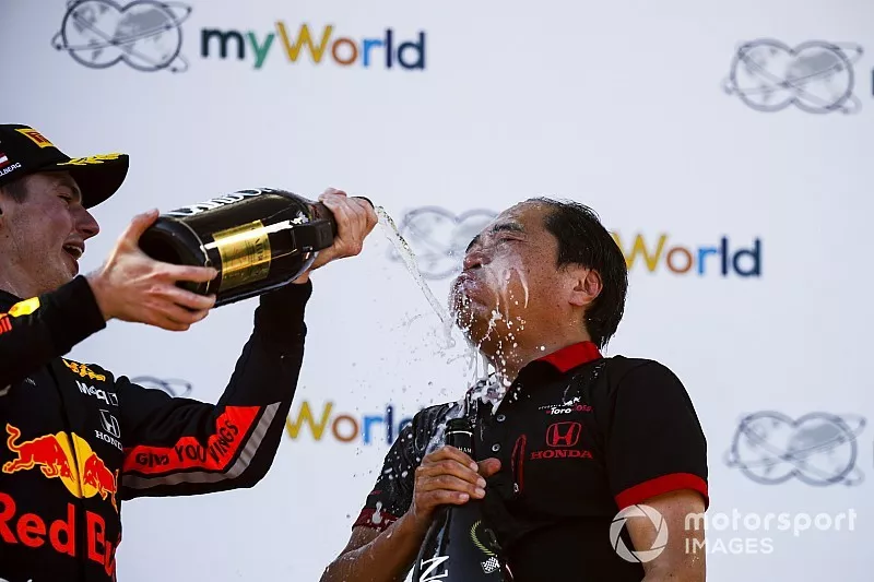 Max Verstappen, Red Bull Racing, 1st position, pours Champagne over Toyoharu Tanabe, F1 Technical Director, Honda