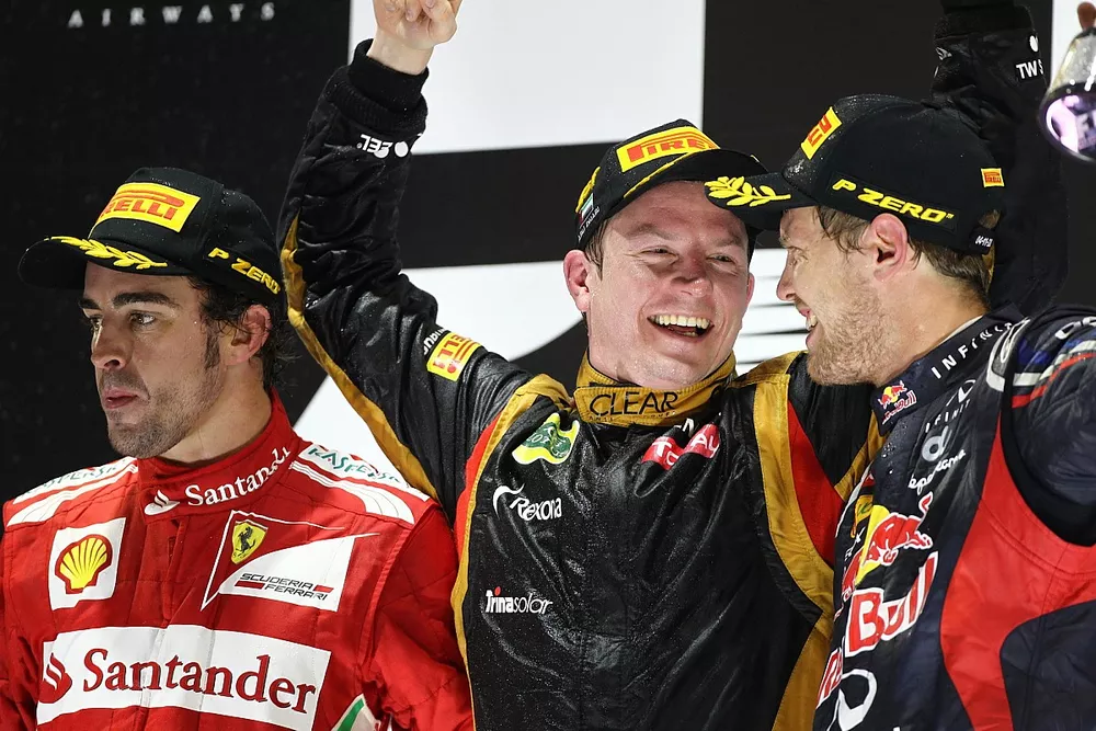 Podium: second place Fernando Alonso, Ferrari, Race winner Kimi Raikkonen, Lotus F1 Team, third plac