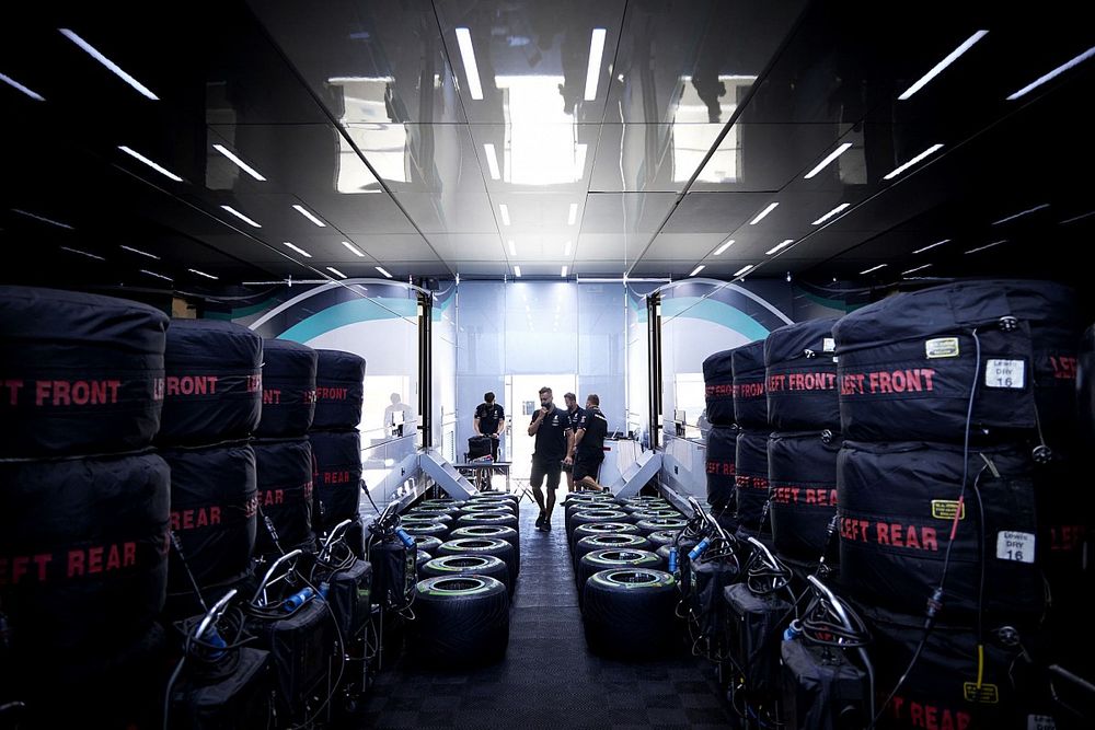 Mercedes team members with Pirelli tyres