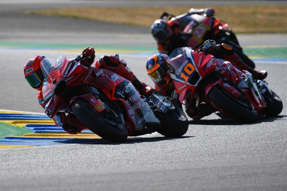 Marc Marquez, Ducati Team, Luca Marini, Honda HRC