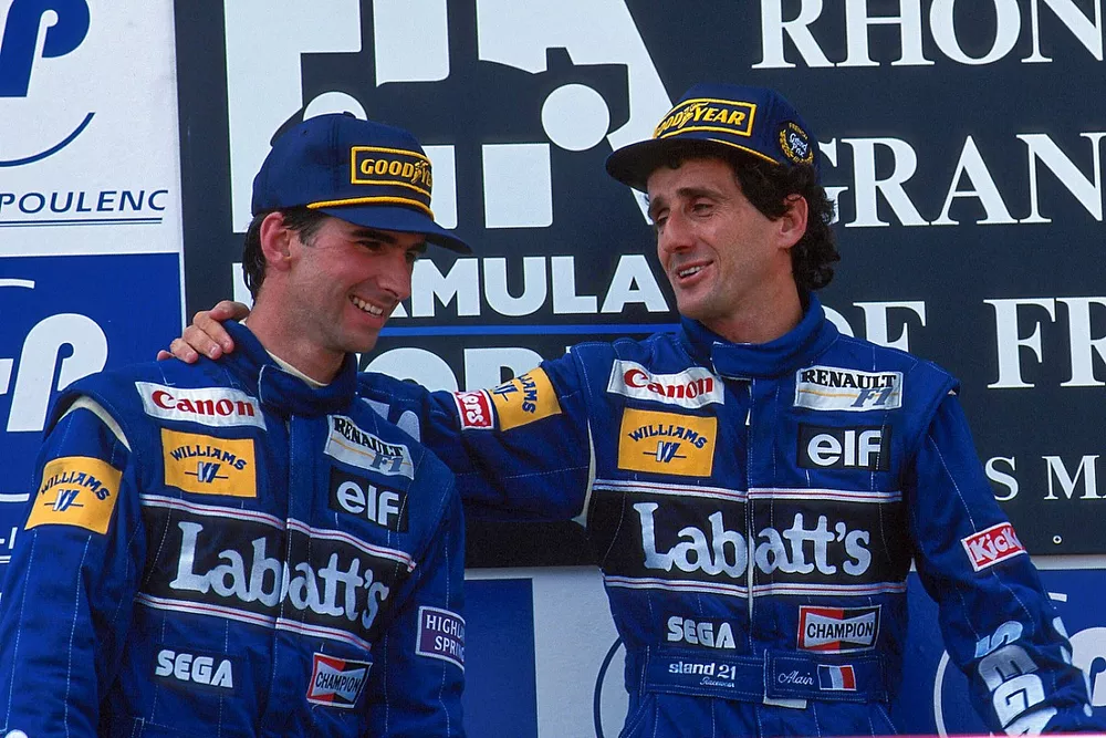 Podium: race winner Alain Prost, second place Damon Hill