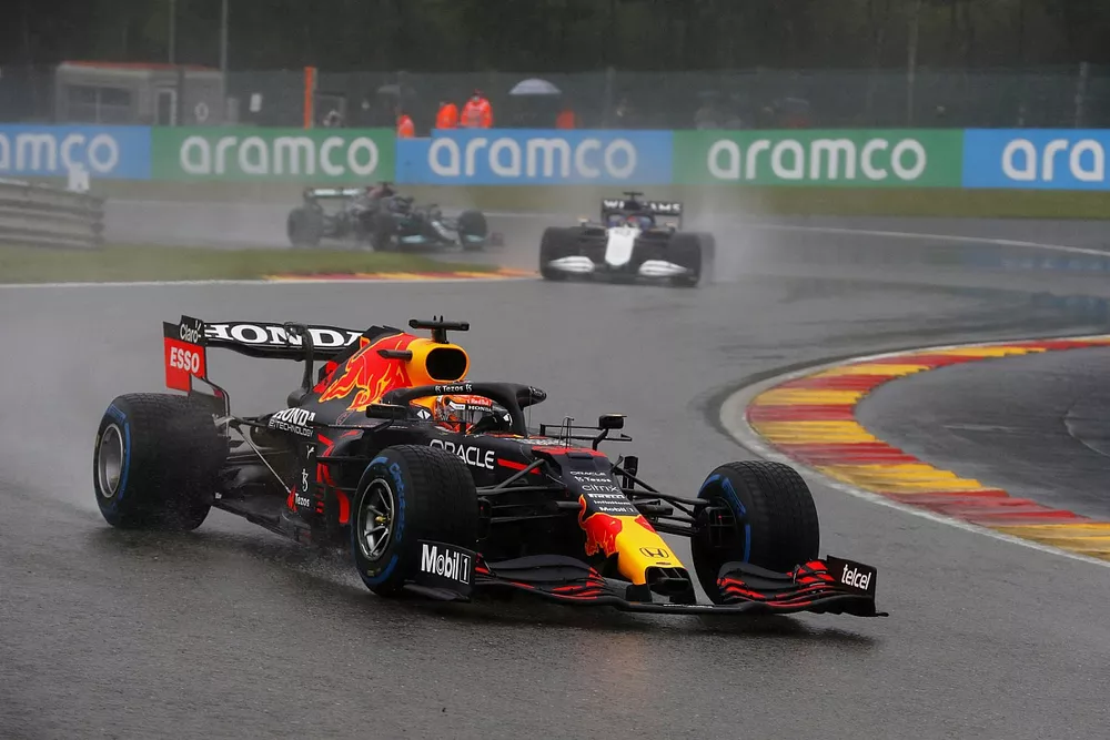 Max Verstappen, Red Bull Racing RB16B, George Russell, Williams FW43B, and Lewis Hamilton, Mercedes W12