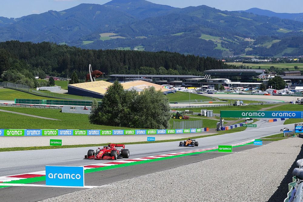 Charles Leclerc, Ferrari SF1000, leads Carlos Sainz Jr., McLaren MCL35
