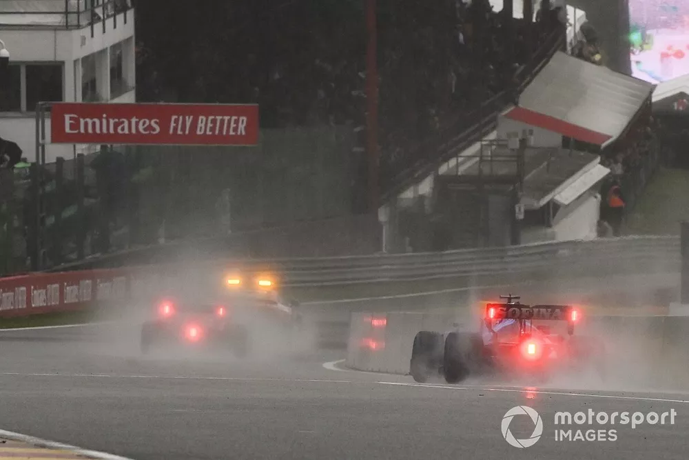 The Safety Car Max Verstappen, Red Bull Racing RB16B, and George Russell, Williams FW43B, out of the pits