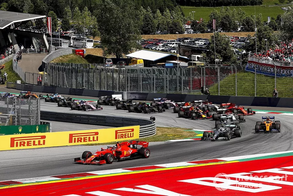 Charles Leclerc, Ferrari SF90 leads Valtteri Bottas, Mercedes AMG W10, Lewis Hamilton, Mercedes AMG F1 W10 and Lando Norris, McLaren MCL34 at the start of the race 