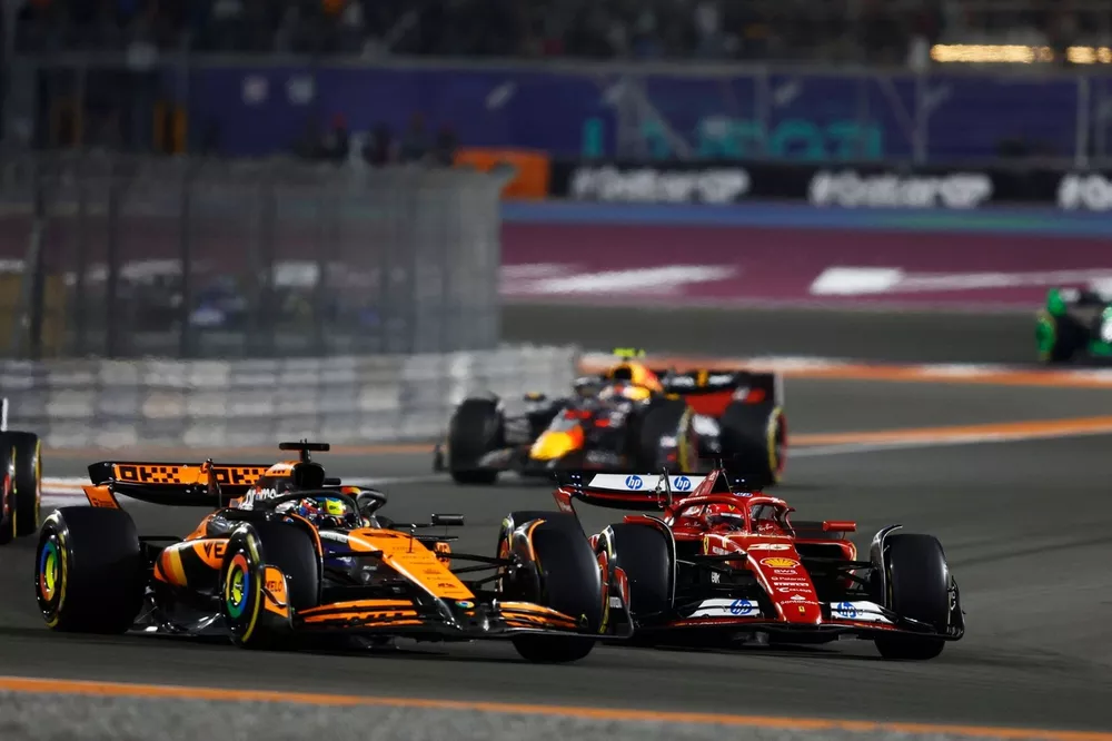 Charles Leclerc, Ferrari SF-24, battles with Oscar Piastri, McLaren MCL38 