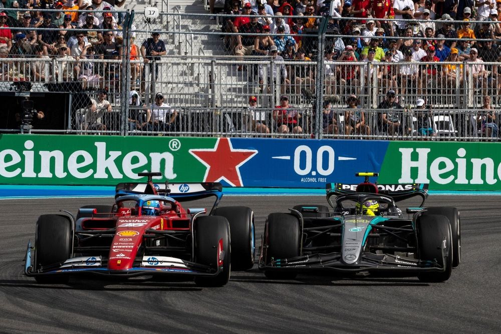 Charles Leclerc, Ferrari SF-24, battles with Lewis Hamilton, Mercedes F1 W15