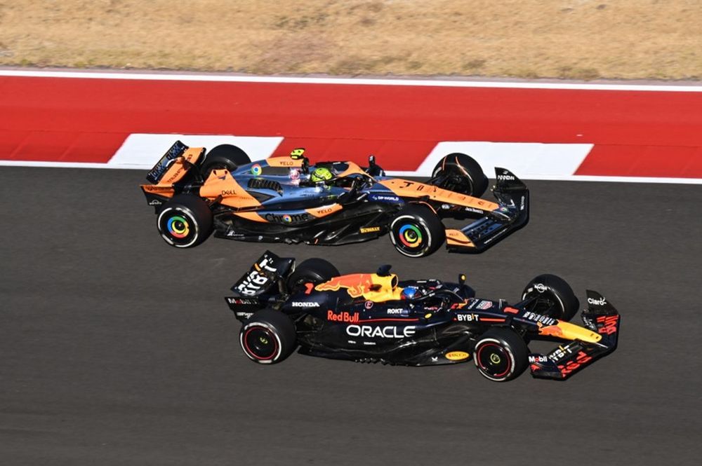 Lando Norris, McLaren MCL38, battles with Max Verstappen, Red Bull Racing RB20