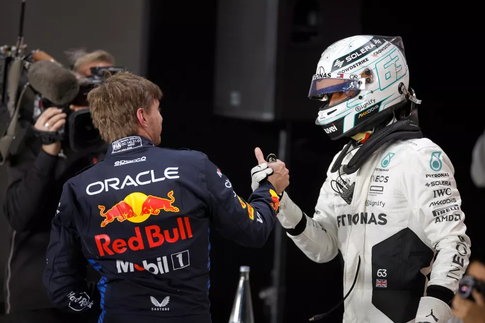 Pole man Max Verstappen, Red Bull Racing, and George Russell, Mercedes-AMG F1 Team, congratulate each other in Parc Ferme