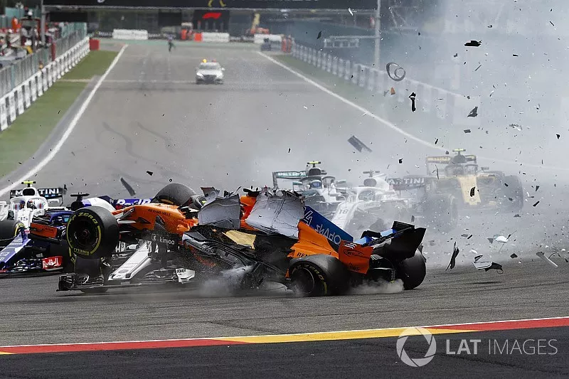 Fernando Alonso, McLaren MCL33, crashes over Charles Leclerc, Sauber C37, after contact from Nico Hulkenberg, Renault Sport F1 Team R.S. 18, at the start
