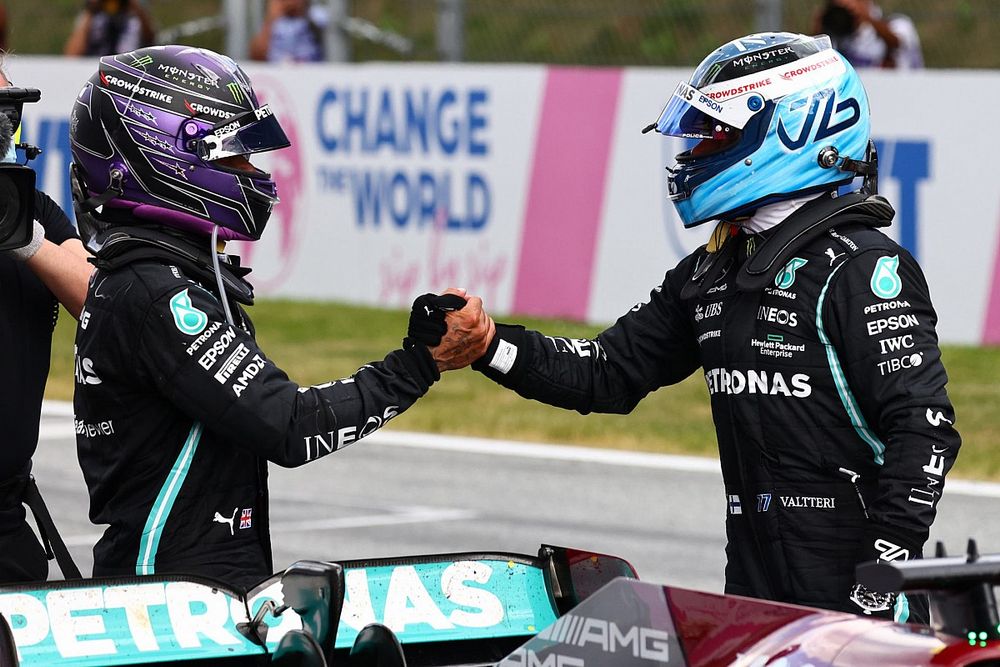 Lewis Hamilton, Mercedes, 2nd position, and Valtteri Bottas, Mercedes, 3rd position, congratulate each other in Parc Ferme