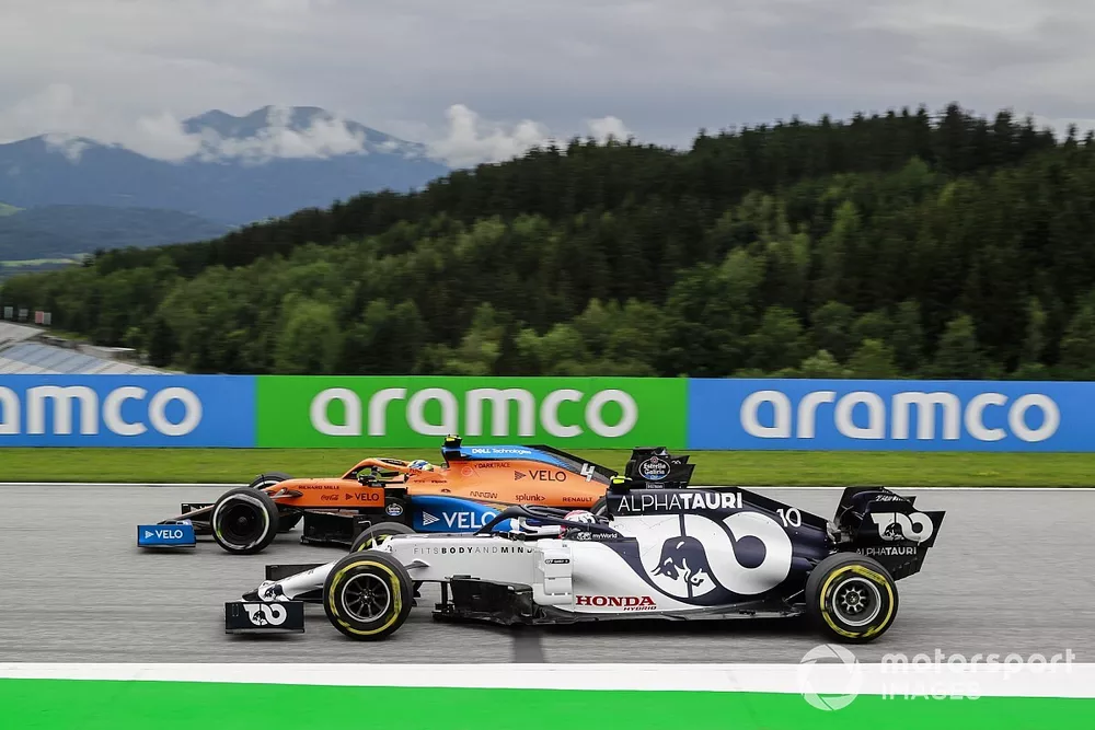 Lando Norris, McLaren MCL35 and Pierre Gasly, AlphaTauri AT01