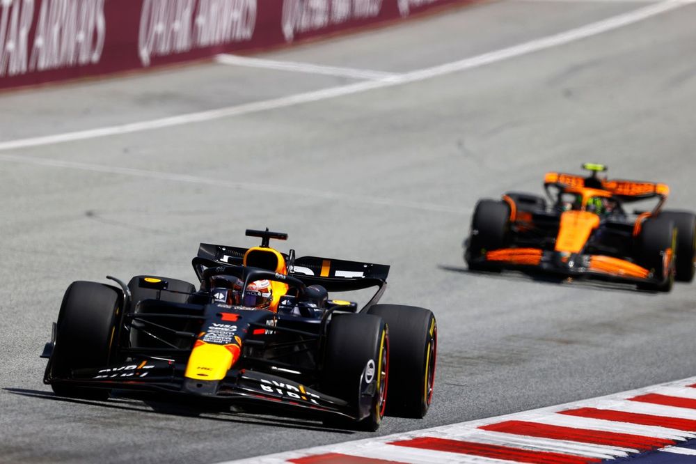 Max Verstappen, Red Bull Racing RB20, leads Lando Norris, McLaren MCL38