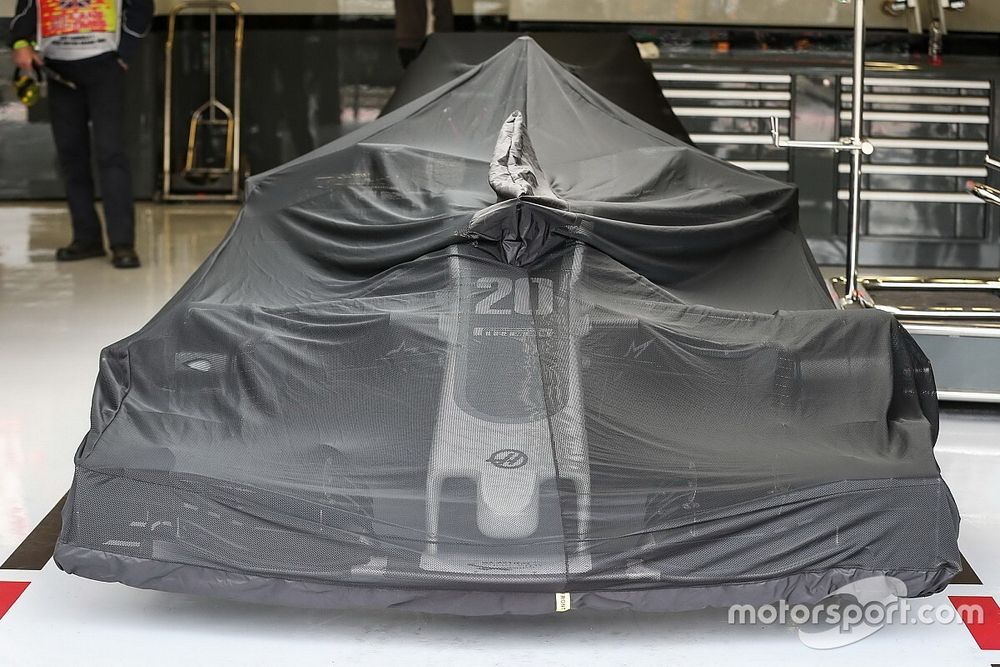 Haas F1 Team VF-17 under covers in the garage