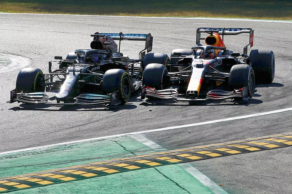 Lewis Hamilton, Mercedes W12, and Max Verstappen, Red Bull Racing RB16B, crash