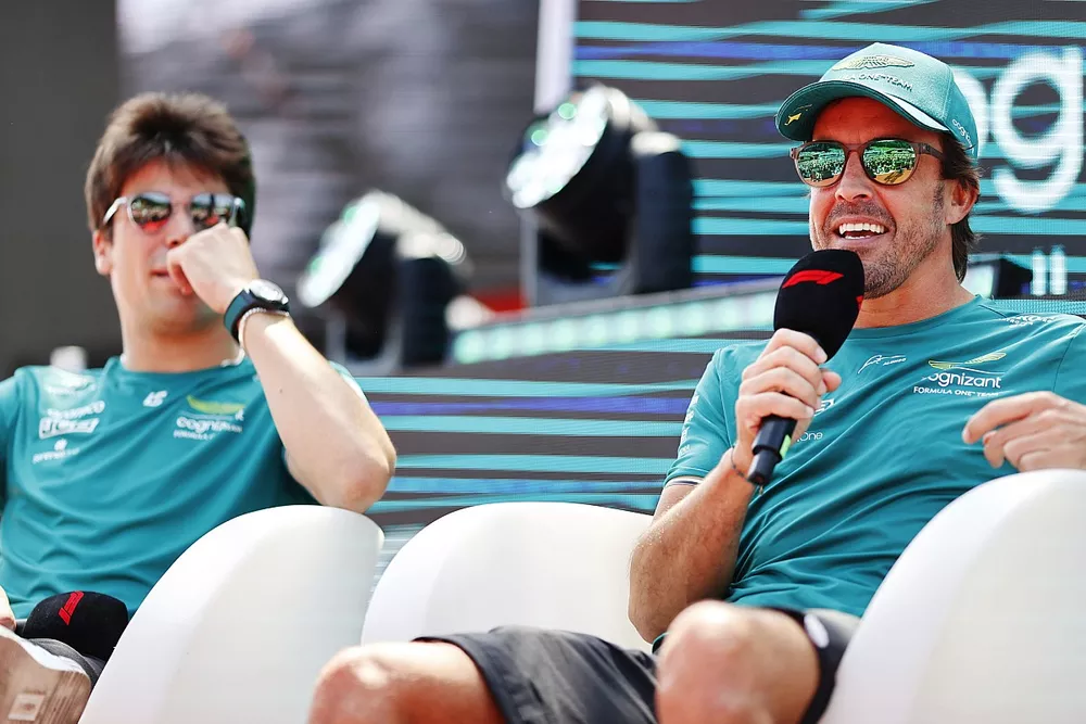 Lance Stroll, Aston Martin F1 Team, with Fernando Alonso, Aston Martin F1 Team, in the fan zone