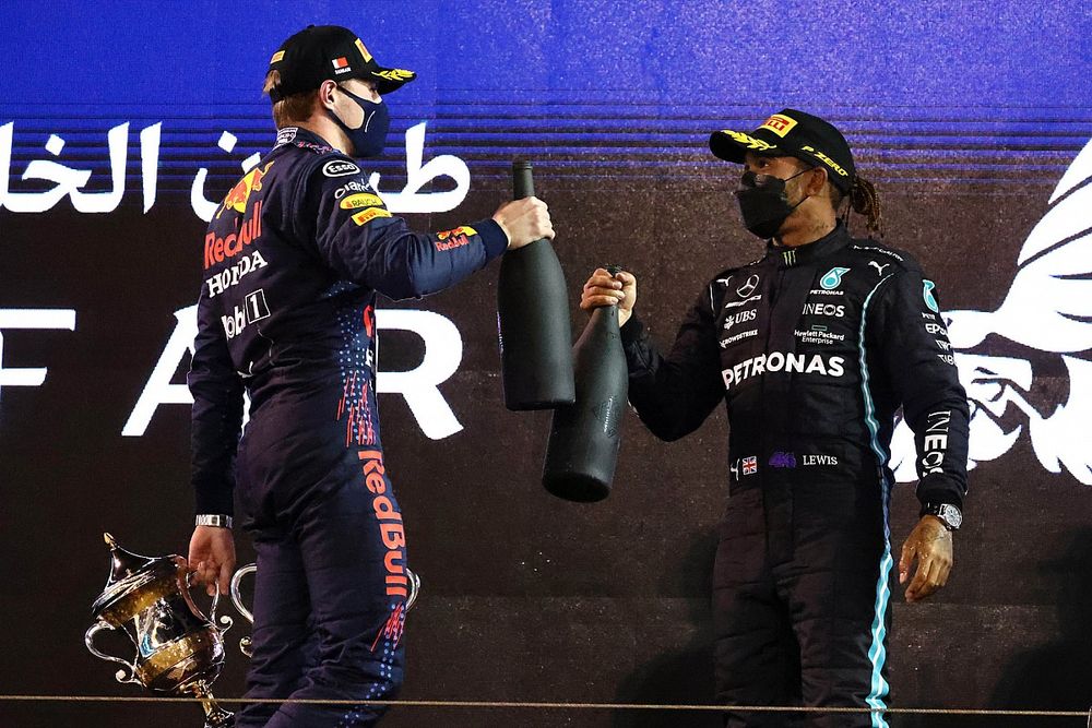 Max Verstappen, Red Bull Racing, 2nd position, and Lewis Hamilton, Mercedes, 1st position, on the podium