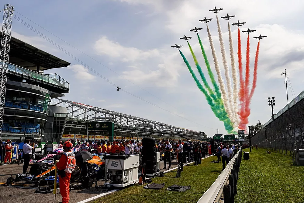 The Italian Air Force Aerobatic Display Team, Frecce Tricolori, display over the grid in their Aermacchi MB339A jet trainers