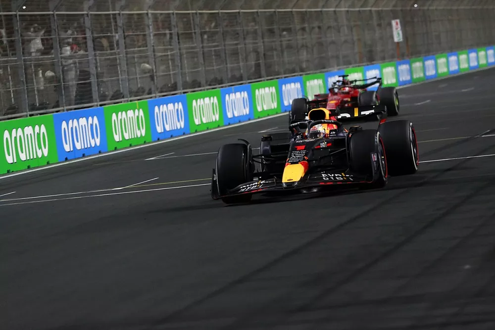 Max Verstappen, Red Bull Racing RB18, 1st position, takes victory ahead of Charles Leclerc, Ferrari F1-75, 2nd position