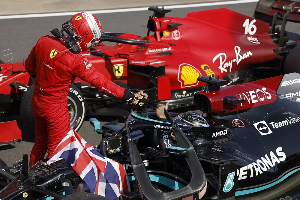 Charles Leclerc, Ferrari, 2nd position, congratulates Lewis Hamilton, Mercedes, 1st position, in Parc Ferme