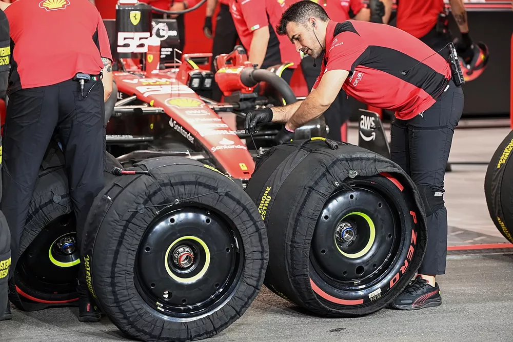 Ferrari mechanics with tyres