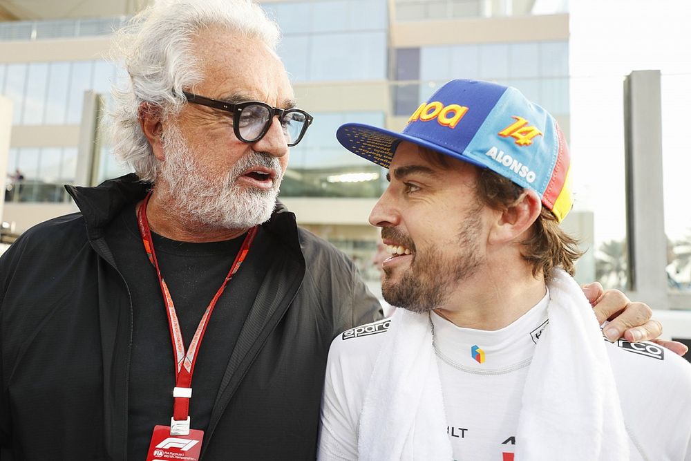 Fernando Alonso, McLaren, with Flavio Briatore on the grid