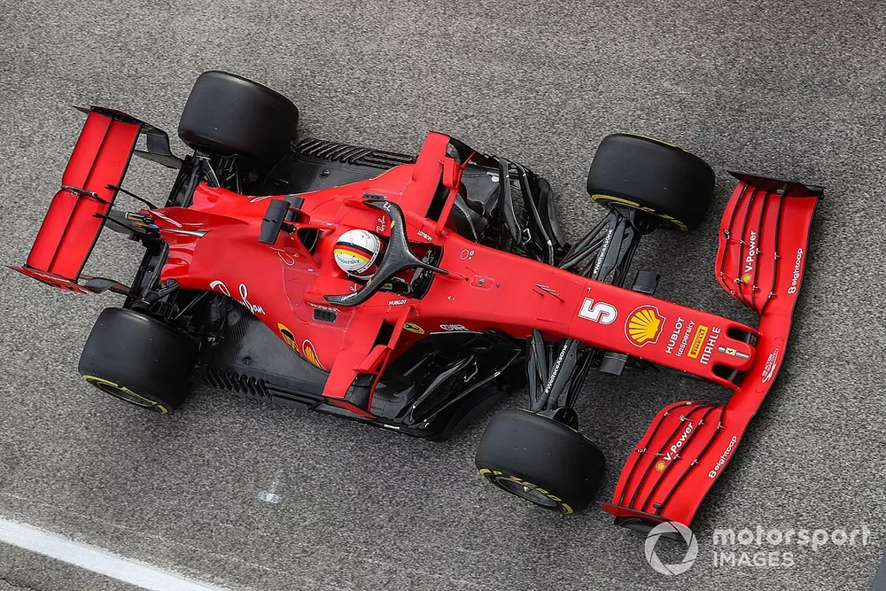 Sebastian Vettel, Ferrari SF1000, heads for the grid