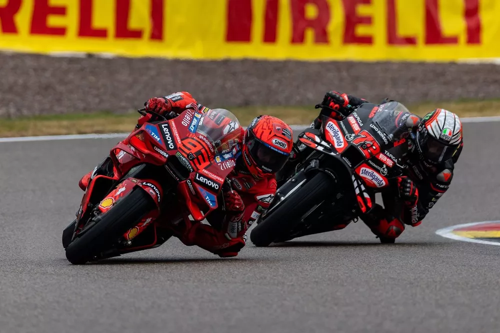 Marc Marquez, Ducati Team, Marco Bezzecchi, Aprilia Racing