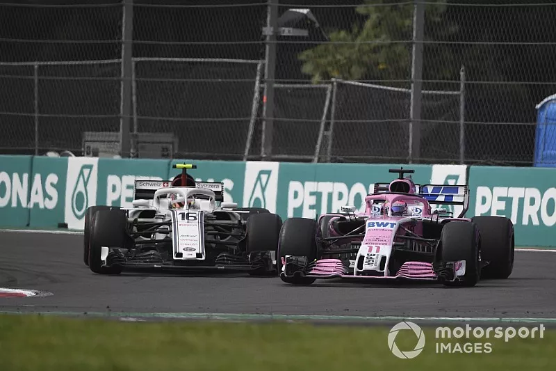 Charles Leclerc, Sauber C37 and Sergio Perez, Racing Point Force India VJM11 battle 