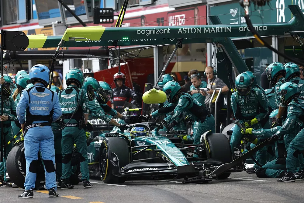 Fernando Alonso, Aston Martin AMR23, makes a pit stop