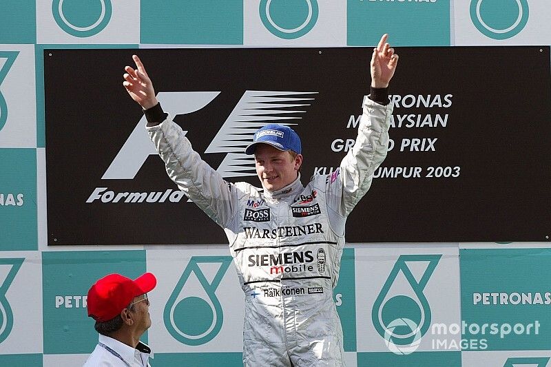 Podium: race winner Kimi Raikkonen, McLaren