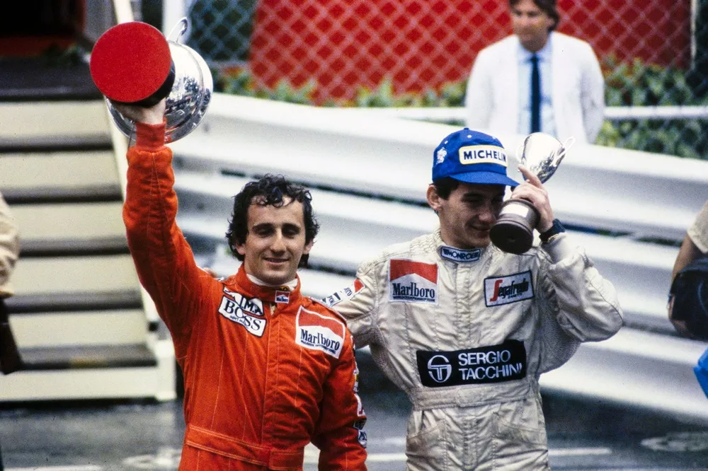 Race winner Alain Prost, McLaren and Ayrton Senna, Toleman, with their trophies
