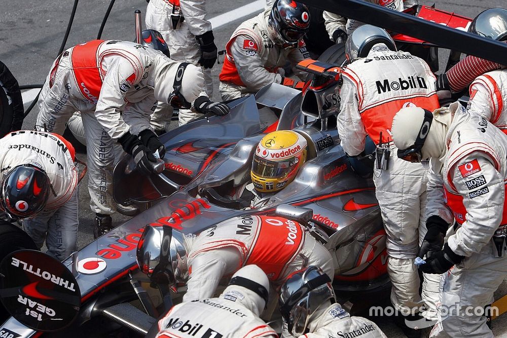 Lewis Hamilton, McLaren MP4-23, makes a stop