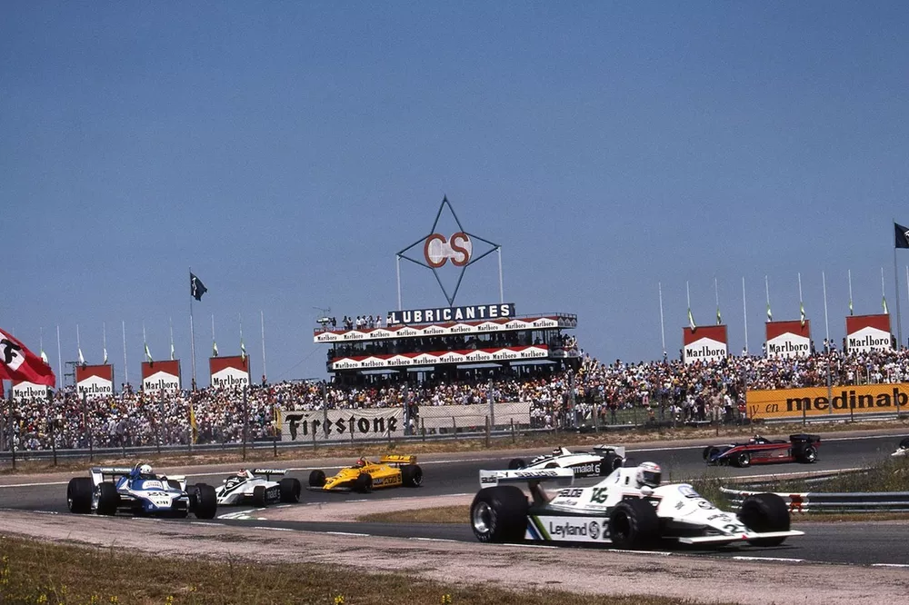 Alan Jones,  Williams FW07 leads Didier Pironi,  Ligier JS11/15 and Nelson Piquet,  Brabham BT4