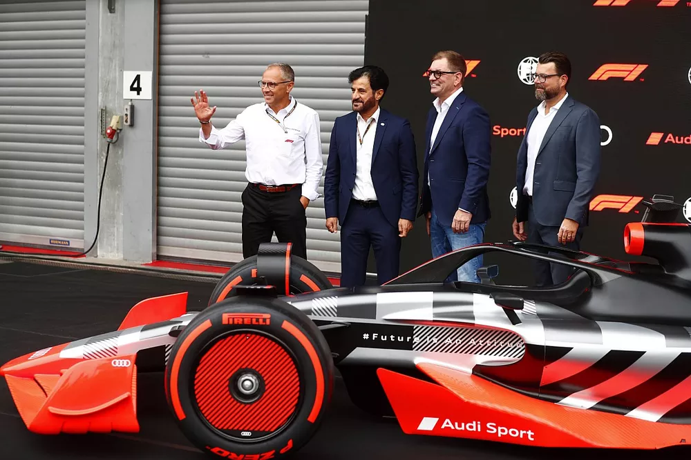 Stefano Domenicali, CEO, Formula 1, with Mohammed bin Sulayem, President, FIA, Markus Duesmann, Chairman of the Board of Management of Audi AG, Oliver Hoffmann, Head of Technical Development at Audi Sport GmbH showcase the new Audi Sport F1 concept car Stefano Domenicali, CEO, Formula 1, with Mohammed bin Sulayem, President, FIA, Markus Duesmann, Chairman of the Board of Management of Audi AG, Oliver Hoffmann, Head of Technical Development at Audi Sport GmbH showcase the new Audi Sport F1 concept car