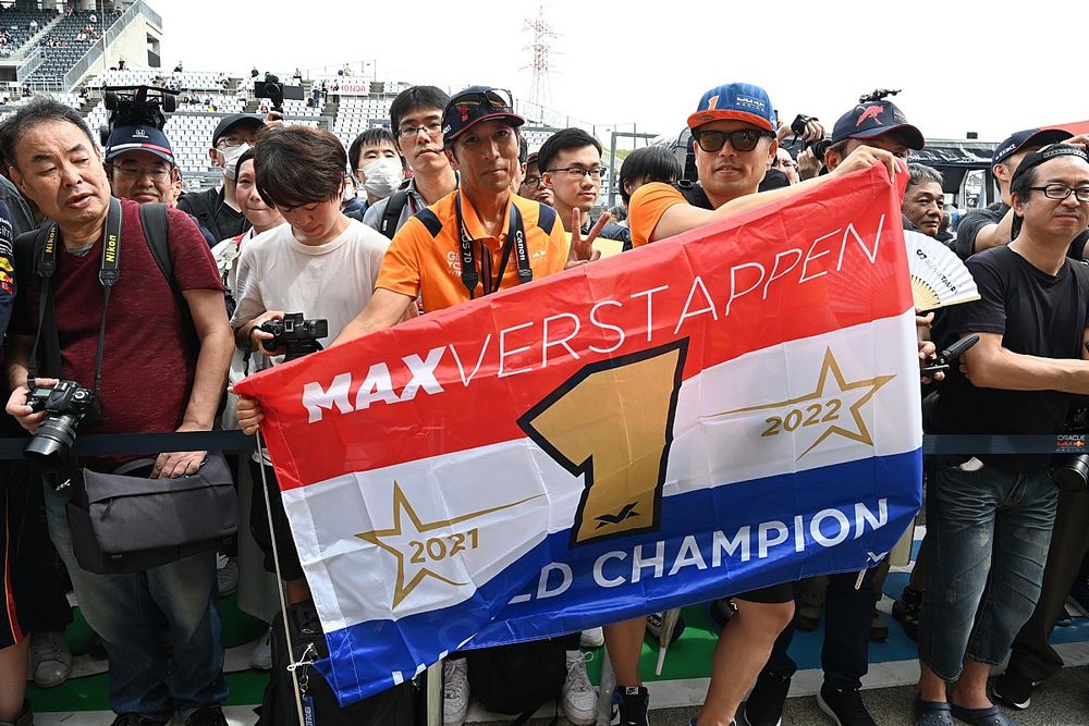 Fans with signs and banners