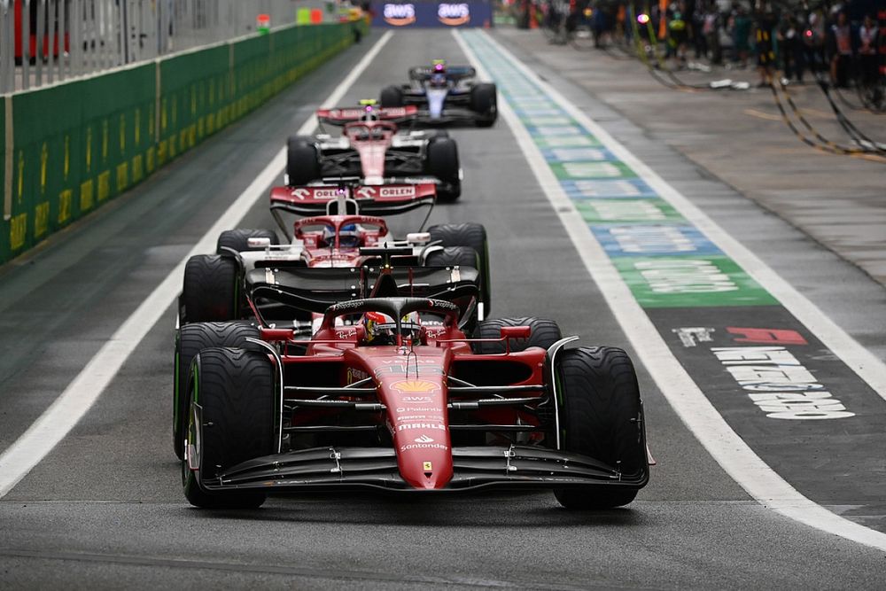 Charles Leclerc, Ferrari F1-75, Valtteri Bottas, Alfa Romeo C42, Zhou Guanyu, Alfa Romeo C42, out of the pits