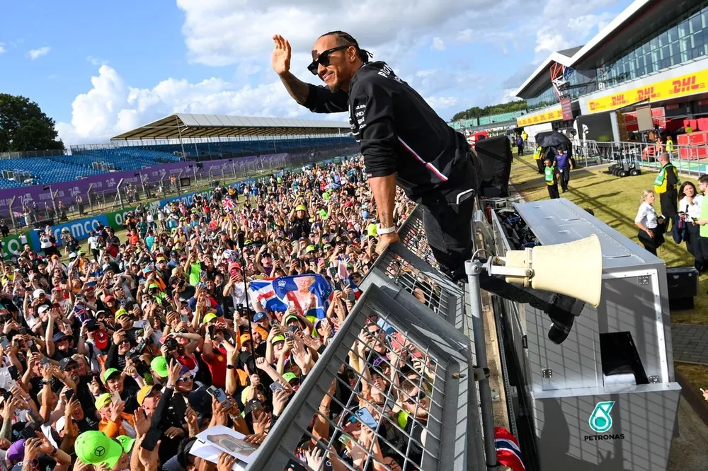 Lewis Hamilton, Mercedes-AMG, 3rd position, celebrates with fans after the race