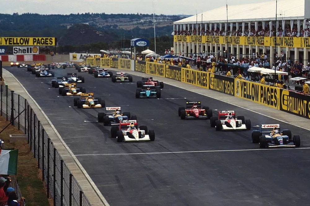 Nigel Mansell, Williams leads at the start of the race