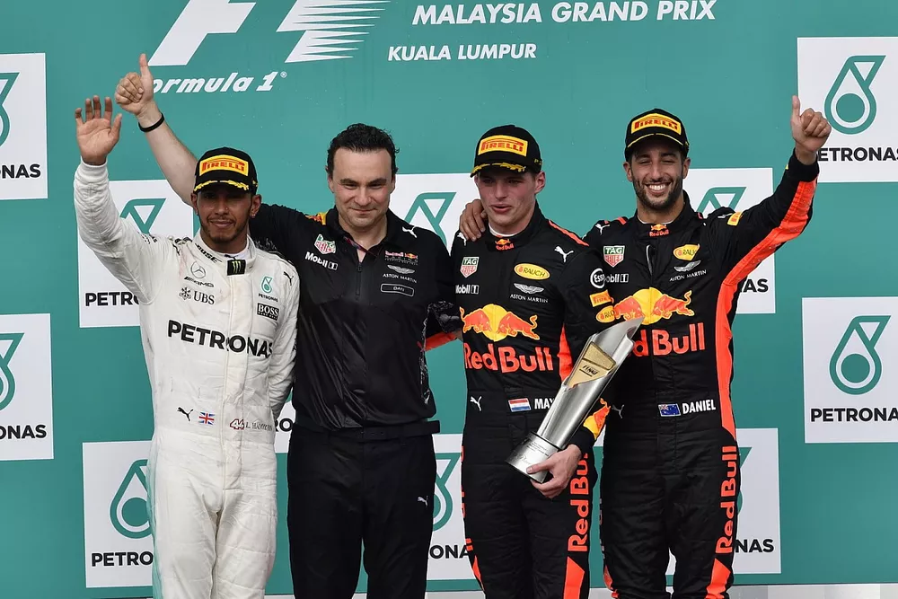 Lewis Hamilton, Mercedes AMG F1, Dan Fallows, Red Bull Racing Head of Aerodynamics, race winner Max Verstappen, Red Bull Racing and Daniel Ricciardo, Red Bull Racing celebrate on the podium, the trophy