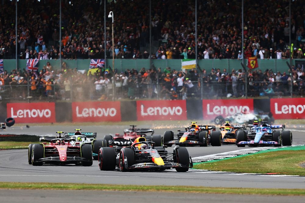 Max Verstappen, Red Bull Racing RB18, Carlos Sainz, Ferrari F1-75, Lewis Hamilton, Mercedes W13, Charles Leclerc, Ferrari F1-75, Sergio Perez, Red Bull Racing RB18 and Esteban Ocon, Alpine A522 as behind George Russell, Mercedes W13 collides with Zhou Guanyu, Alfa Romeo C42 