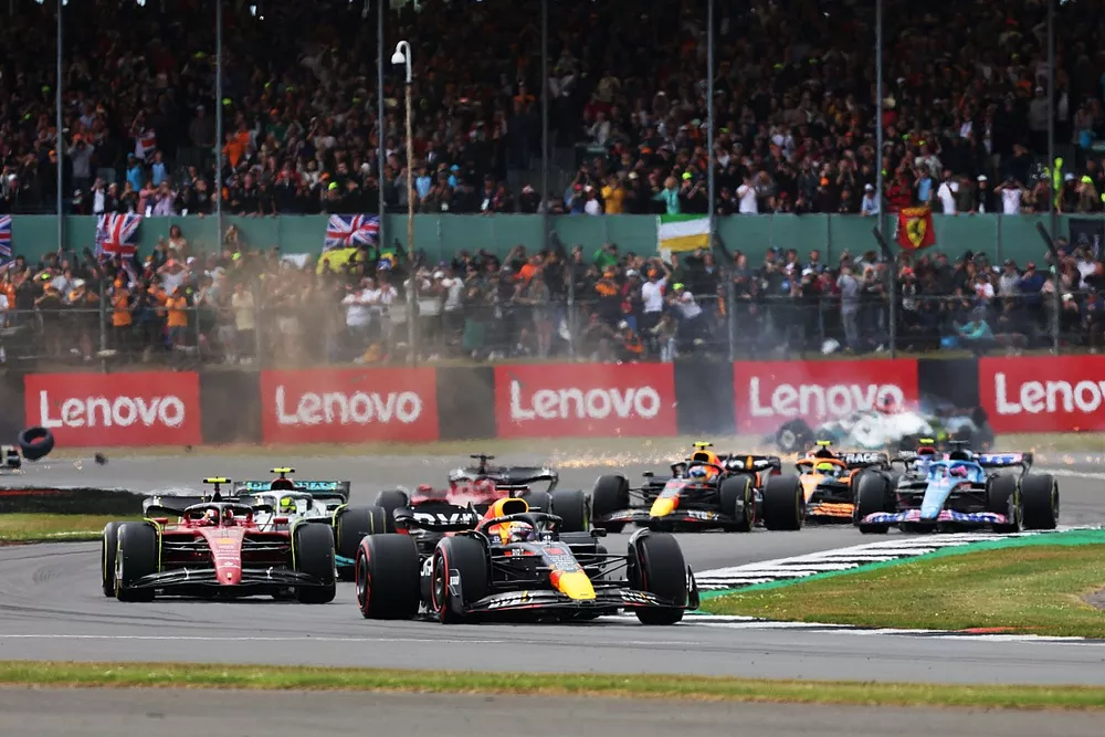 Max Verstappen, Red Bull Racing RB18, Carlos Sainz, Ferrari F1-75, Lewis Hamilton, Mercedes W13, Charles Leclerc, Ferrari F1-75, Sergio Perez, Red Bull Racing RB18 and Esteban Ocon, Alpine A522 as behind George Russell, Mercedes W13 collides with Zhou Guanyu, Alfa Romeo C42 