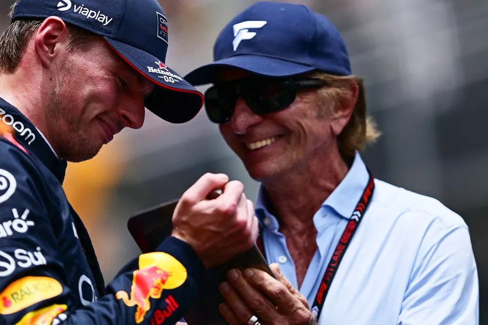 Emerson Fittipaldi presents the third placed trophy to Max Verstappen, Red Bull Racing,