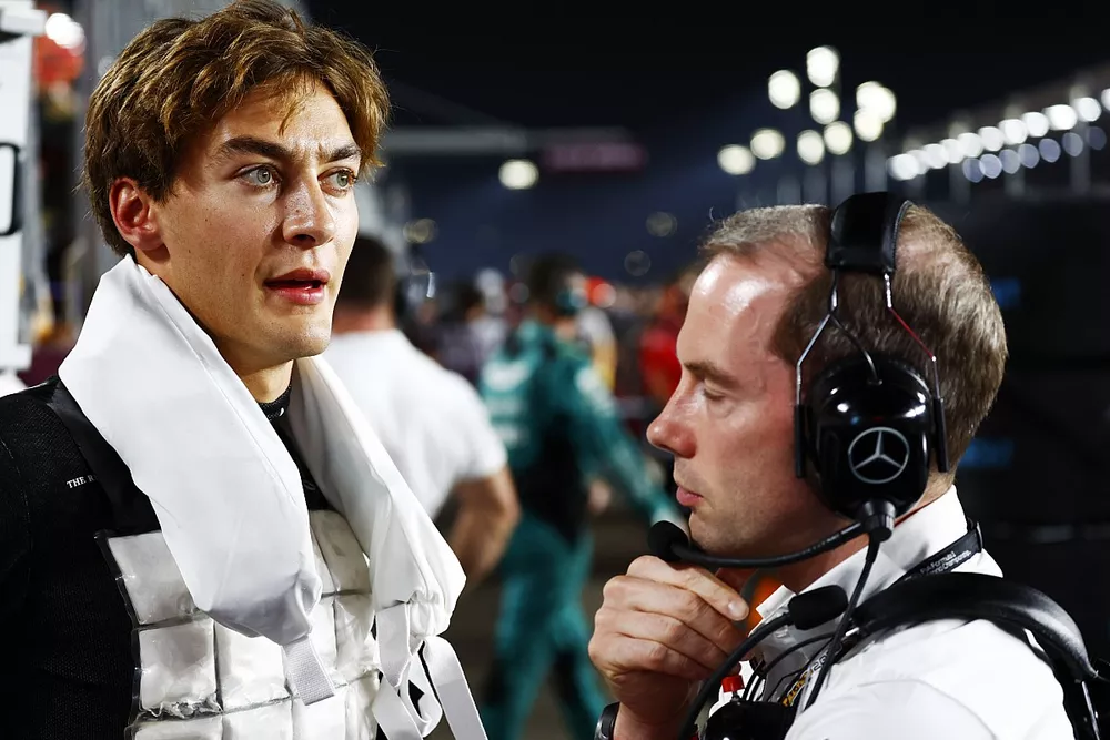 George Russell, Mercedes-AMG, on the Sprint grid with an engineer