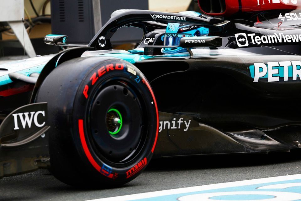 George Russell, Mercedes F1 W15, in the pit lane