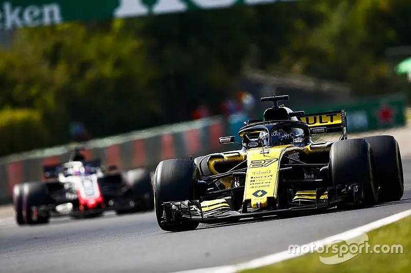 Nico Hulkenberg, Renault Sport F1 Team R.S. 18, leads Romain Grosjean, Haas F1 Team VF-18